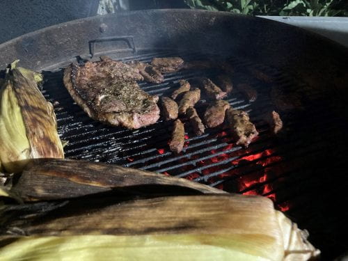 carne on the grill with corn